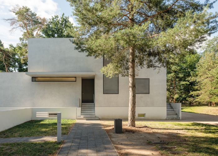 A photograph of a minimalist house crafted in the Bauhaus style in Dessau, Germany.